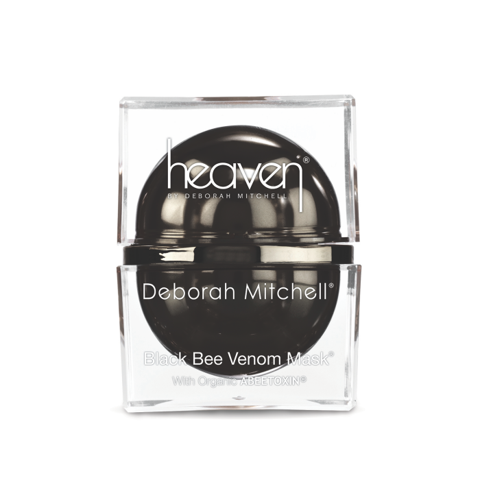 Photo of Heaven's Black Bee Venom Mask from the front in a clear square container with a black sphere in the middle of it and white writing on the front that reads Black Bee Venom Mask with organic ABEETOXIN.